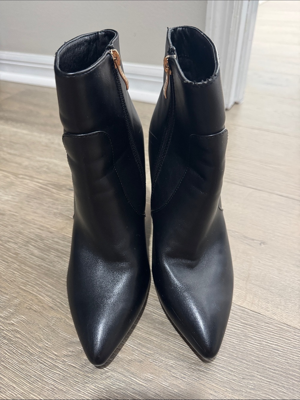 IDIFU Black Faux Leather Pointed Toe Ankle Boots with Gold Zippers
